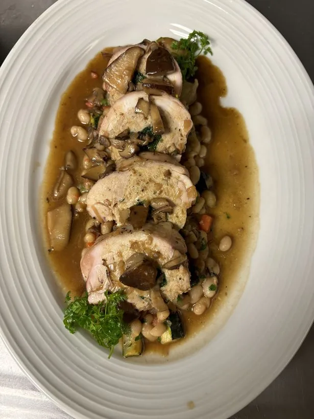 Rabbit medallions with white beans and mushroom jus