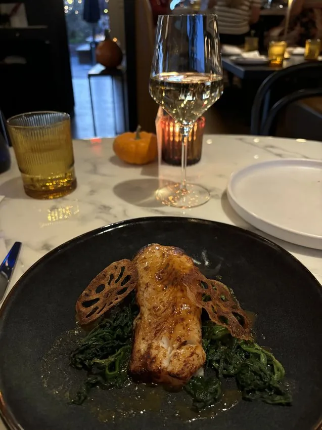 Seared fish with white wine — evening dining